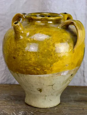 Antique French water jug with yellow and green glaze