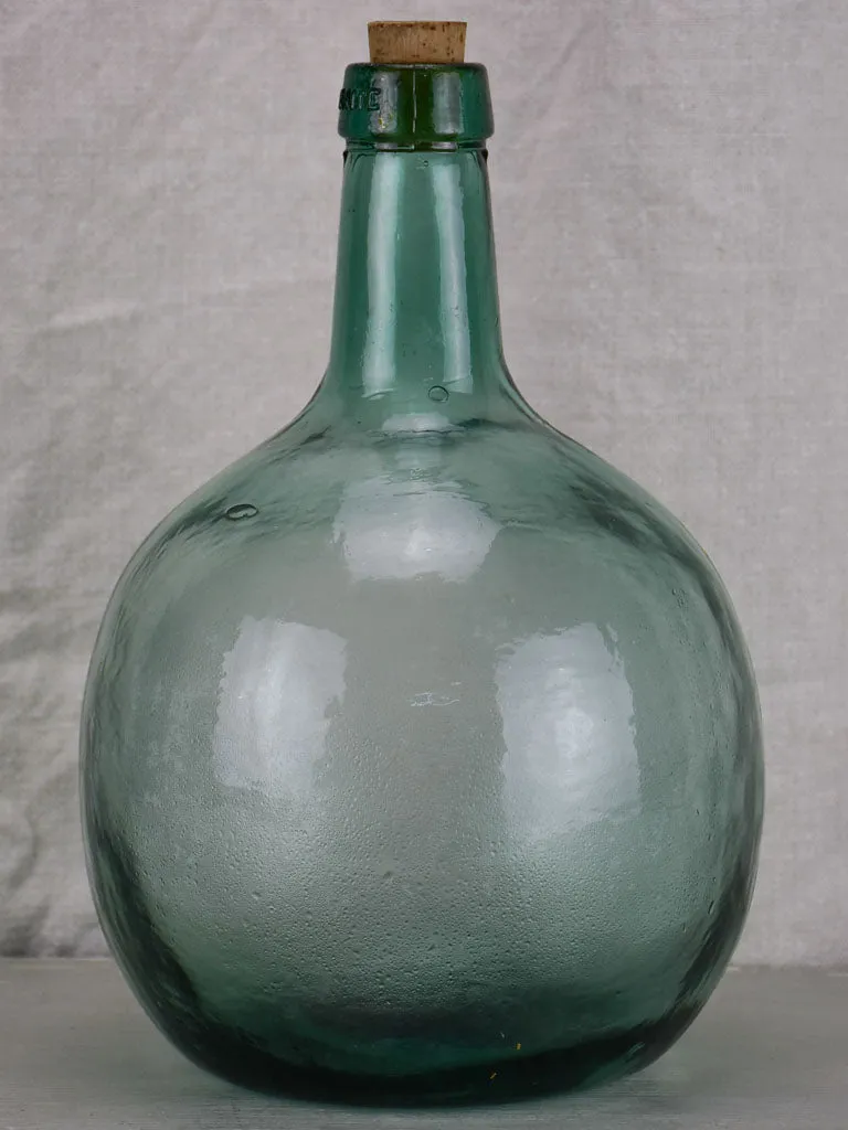 Small antique French demijohn bottle