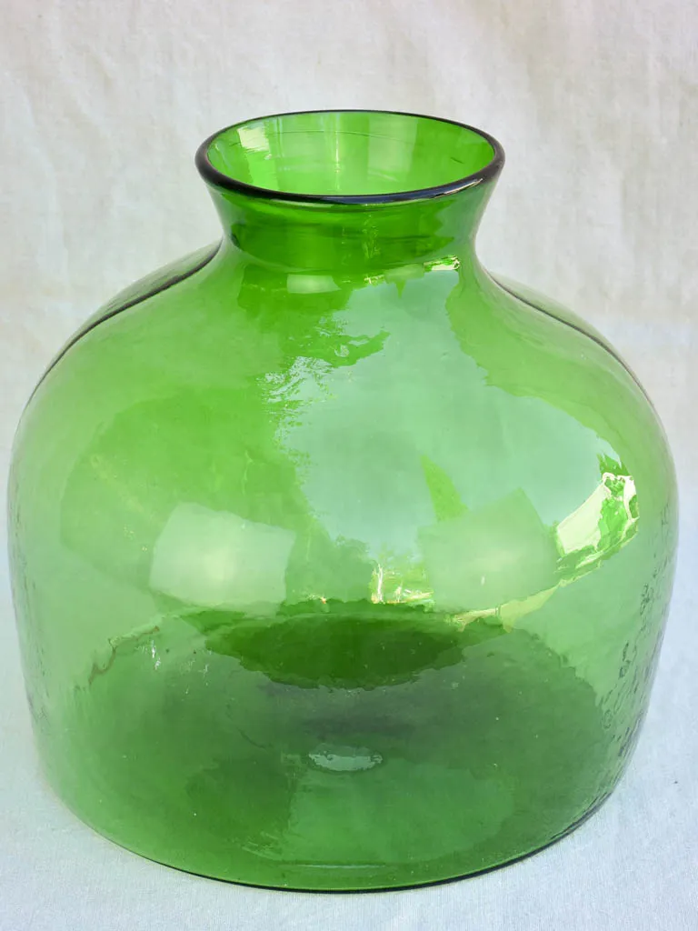 Three very large green glass vases / bottles 13½"